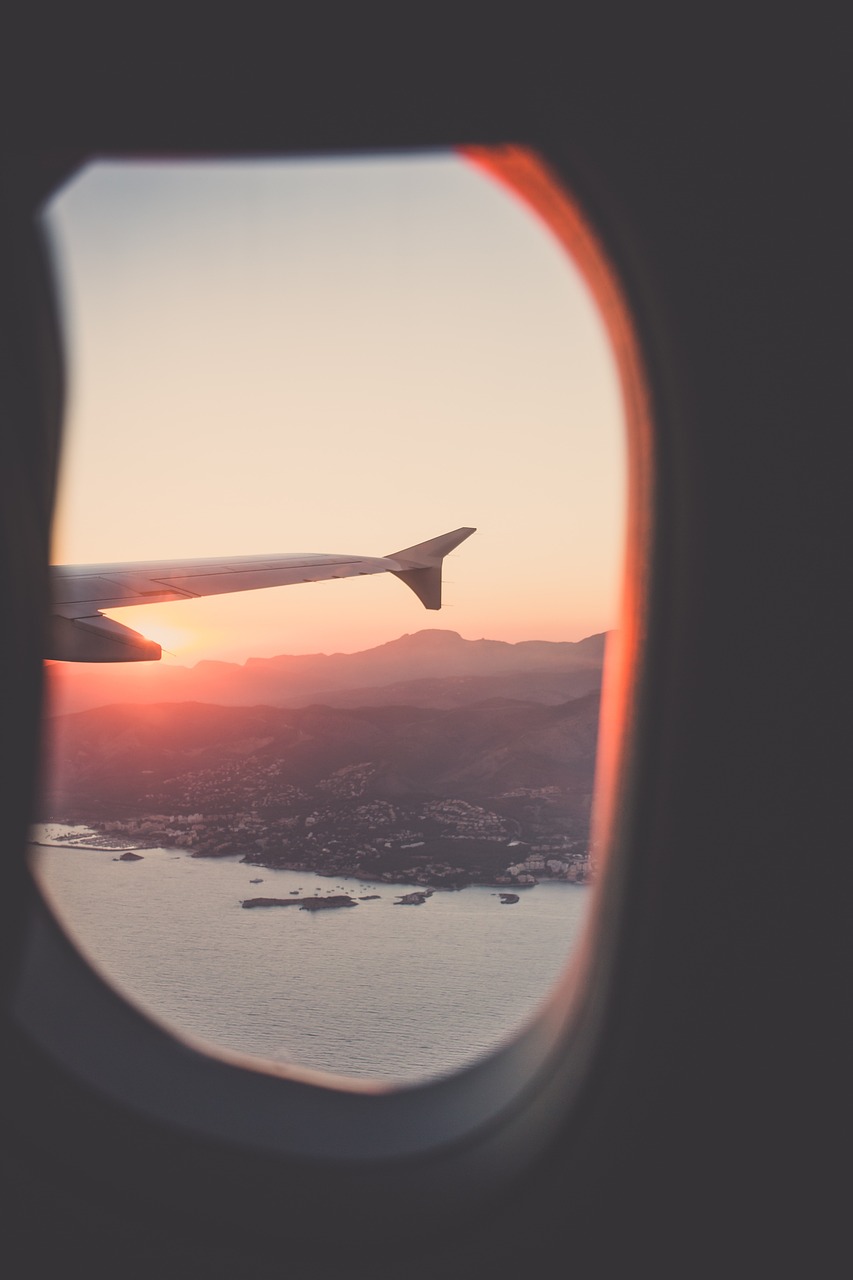 window, airplane, travel, trip, sky, sea, mountain, sunrise, sunset, gray sunset, gray sunrise, gray window, gray plane, nature, gray airplane